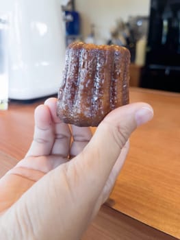 Fresh homemade caneles french pastry, stock photo