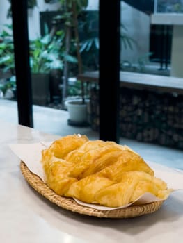 French breakfast with pastries at work from home, stock photo