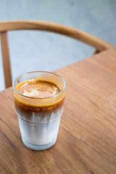 Dirty coffee on wooden table, stock photo