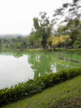 Evening cloudy sky reflected in lake, stock photo