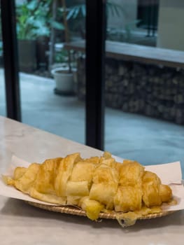 French breakfast with pastries at work from home, stock photo