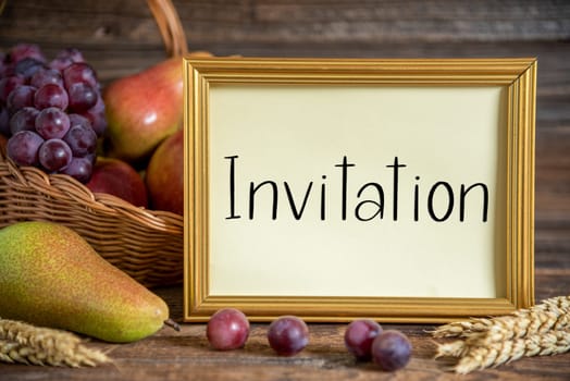 Fall Decoration with Pears, Apples and Grapes, Thanksgiving Background, Autumn Season and Text Invitation