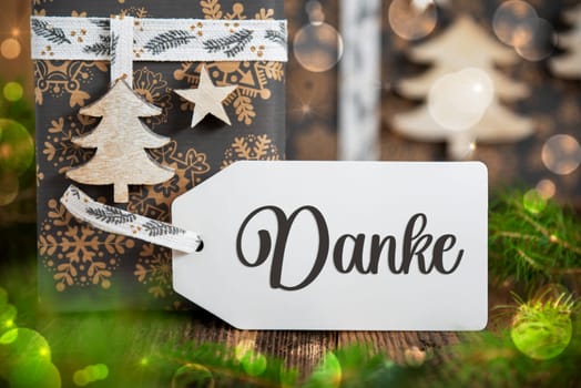 German Text Danke, Means Thanks In English, On A White Label With Christmas Presents, Winter Gifts, Natural, Eco Friendly Background