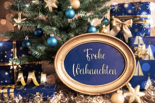 Oval Golden Frame With German Text Frohe Weihnachten, Which Means Merry Christmas In English, Blue And Golden Decorated Christmas Tree As Winter And Christmas Background