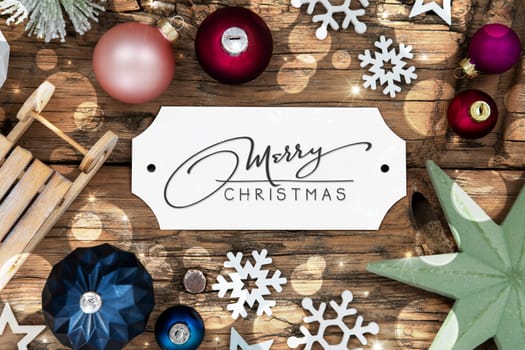 Colorful Christmas Decor With Bokeh, Christmas Balls And Snowflakes, With Sign With Calligraphy Text Merry Christmas