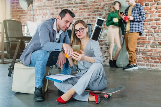Fresh and young businesspeople working together in start-up business