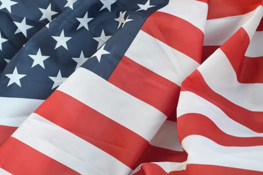 United States of America waving flag with many folds. Patriotic background for USA Memorial Day design
