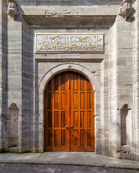 Side entrance of Ottoman Baroque style Ayazma Mosque, Uskudar district, Istanbul, Turkey. Text above translate: Peace be on you, enter you Paradise, because of which you used to do