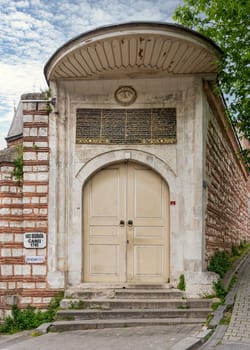 Entrance of Ottoman baroque style Haci Besir Aga Mosque, located in Fatih district, Istanbul, Turkey, built in 1719