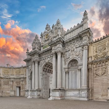 Grand entrance to the 19th century Ottoman Dolmabahce Palace in Istanbul, Turkey. The entrance is decorated with intricate carvings