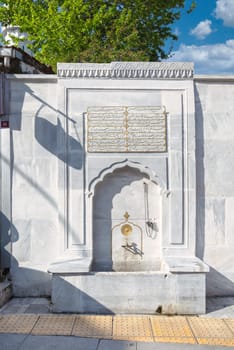 Genc Mehmet Pasa Cesmesi, a 16th-century public drinking fountain located in Uskudar district of Istanbul, Turkey. The fountain is made of marble and features intricate carvings