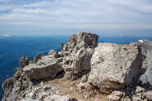 Panorama of massive Alpine mountains. Landscape in the Austrian Alps of the Dachstein region (Styria in Austria) - view from Dachstein