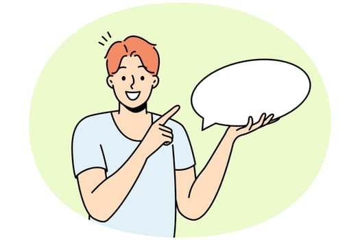 Smiling young man holding speech bubble in hands. Happy guy point at mockup empty blank copy space for advertising. Vector illustration.