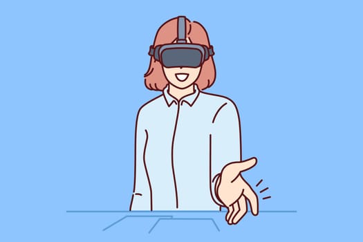 Business woman uses VR headset for online meeting with partners or employees. Businesswoman shakes hands with virtual interlocutor and communicates with colleagues remotely thanks to VR technology