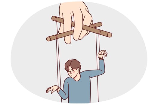Hand holding man on ropes manipulating steps and actions. Puppeteer control unhappy guy. Manipulation and lack of freedom. Vector illustration.