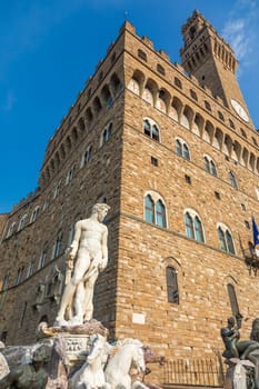 Florence, Italy - Neptune Fountain. Marble sculpture, Renaissance masterpiece, naked Poseidon statue