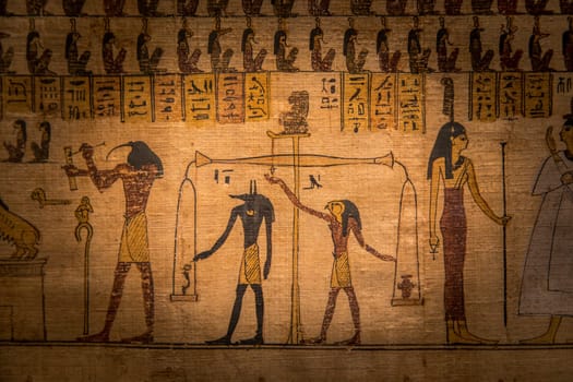 Turin, Italy - February 2023: Egyptian Museum. Detail of the Book of the Dead with funerary formulas and spells, papyrus, 330 BC