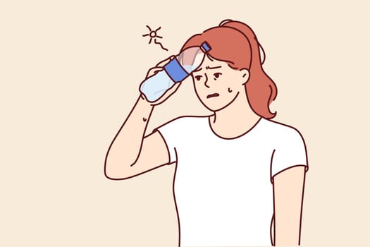 Woman who gets heatstroke on walk puts bottle of water to forehead and needs to rest or see doctor. Girl suffering from heatstroke due to sudden change in weather or working outdoors
