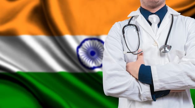 Doctor with stethoscope on India flag. Doctor with arms crossed on India flag background. Medical health and care on Indian flag
