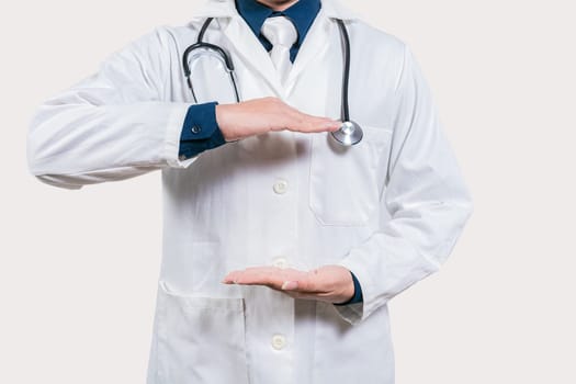 Doctor hands presenting something empty handed. Doctor holding something in his hands isolated, Unrecognizable doctor holding empty hands isolated