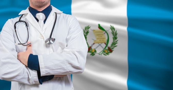 Doctor with stethoscope on guatemala flag. Doctor arms crossed with stethoscope on Guatemala flag, Guatemala national health concept