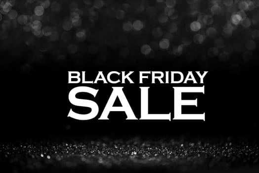 Black friday bokeh background. Elegant dark blur layout design. Silver and black glitter place on table with spotlight. Luxury abstract banner with copyspace.