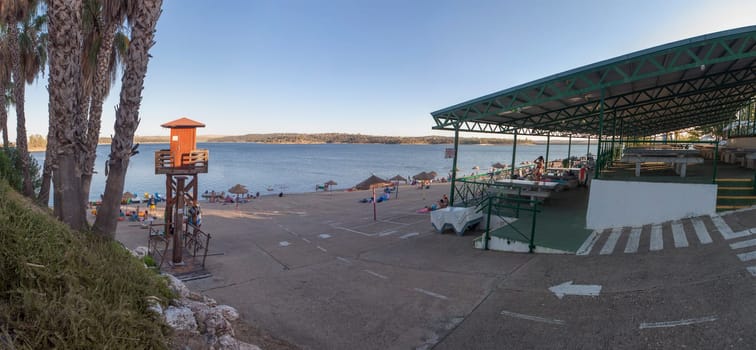 Orellana, Spain - August 4th, 2023: Costa Dulce de Orellana, unique inland beach in Spain awarded with the Blue Flag, Badajoz, Spain