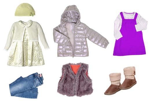 Collage set of little girl autumn or spring clothes isolated on white. Kids apparel collection. Childs fashion clothing outfit. Down jacket, skirt, vest, dresses and jeans.