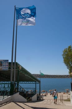 Orellana, Spain - August 4th, 2023: Costa Dulce de Orellana, unique inland beach in Spain awarded with the Blue Flag, Badajoz, Spain