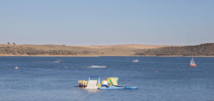 Costa Dulce de Orellana, unique inland beach in Spain awarded with the Blue Flag, Badajoz, Spain. inflatable water park