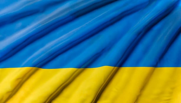 Beautiful silk flag of Ukraine with soft folds in the wind.