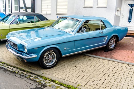 WETTENBERG, HESSE, GERMANY - 07 - 28 - 2023: Classic FORD Mustang at a traditional Car Show Golden Oldies in Krofdorf-Gleiberg near Giessen, Hesse.