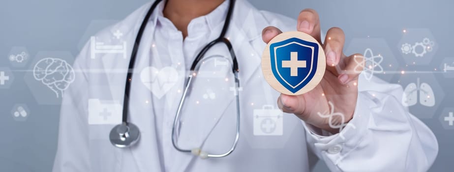 Doctor showing circle wood plank and plus sign represents medical health care and doctor staff service concept.