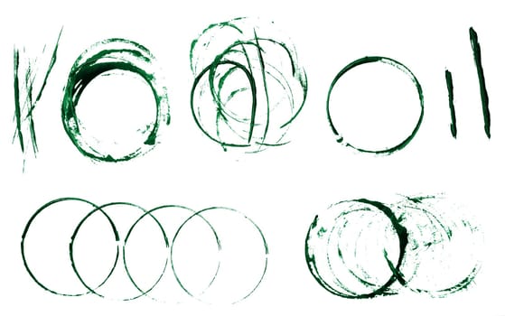 Round prints of green acrylic paint with drops on a white isolated background