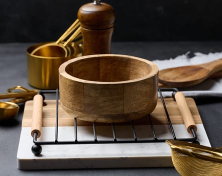 Empty round wooden bowl on the table