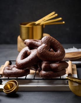 Chocolate gingerbread cookies on black table