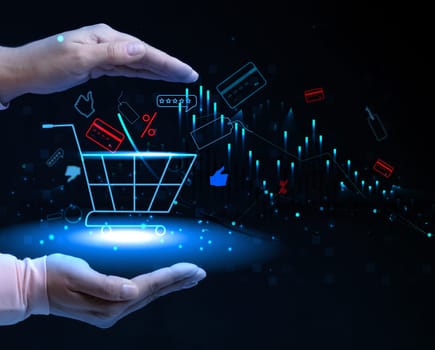 A female hand and a shopping cart icon, concept of starting a sale, online shopping, increasing business profits during seasonal discounts.