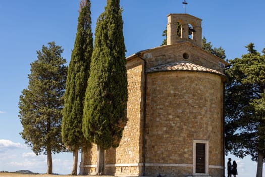 Pienza, Italy - September 12, 2022: Capella Di Vitaleta in countryside between San Quirico and Pienza in Val d Orcia Tuscany. Italy