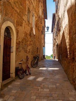 Pienza, Italy - Sept 12, 2022: Pienza, a tiny village in the Tuscany, known as the ideal city of the Renaissance and a capital of pecorino cheese. UNESCO World Heritage Site.