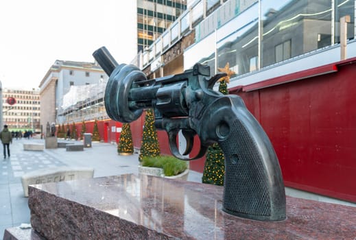 STOCKHOLM, SWEDEN- DECEMBER 23, 2020: A statue for non violence created by Fredrik Reutersward in the swedish capital.