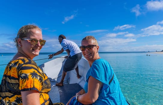 Nacula, Fiji: Tourists in a boat near Nacula island, Yasawa islands, Fiji, South Pacific Islands, Pacific