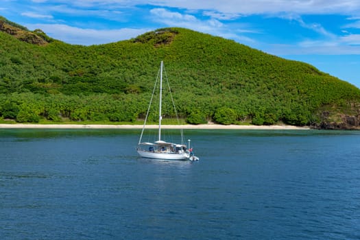 Nacula, Fiji: 26 May 2023: Boat at the tropical sandy beach of Nacula island, Yasawa islands, Fiji, South Pacific Islands, Pacific