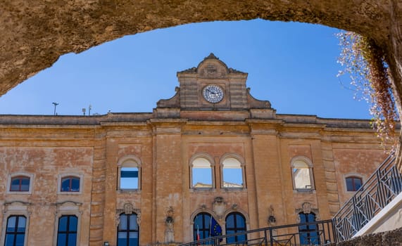 Matera, Italy - 6 May 2023: Building of Palazzo dell'Annunziata on Piazza Vittorio Veneto square in Matera