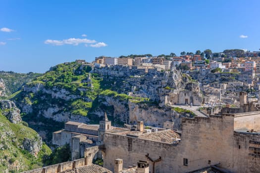 Matera, Italy - 6 May 2023: Old town of Matera (Sassi di Matera), Basilicata, southern Italy. Prehistoric cave dwellings