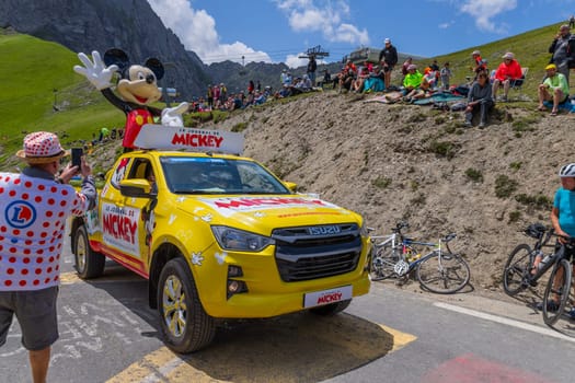 Col du Tourmalet, France - July 06 2023: Caravan car at the top of the Col du Tourmalet in Pyerenees mountains during the stage 6 of Le Tour de France 2023
