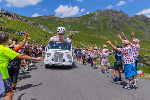 Col du Tourmalet, France - July 06 2023: Caravan car at the top of the Col du Tourmalet in Pyerenees mountains during the stage 6 of Le Tour de France 2023