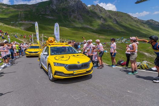 Col du Tourmalet, France - July 06 2023: Caravan car at the top of the Col du Tourmalet in Pyerenees mountains during the stage 6 of Le Tour de France 2023