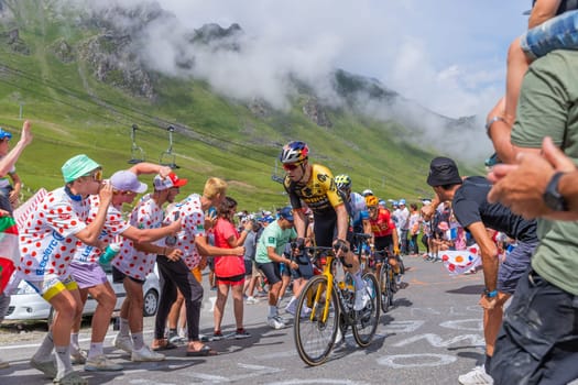 Col du Tourmalet, France - July 06 2023: Wout van Aert climbig the road to Col du Tourmalet in Pyerenees mountains during the stage 6 of Le Tour de France 2023.