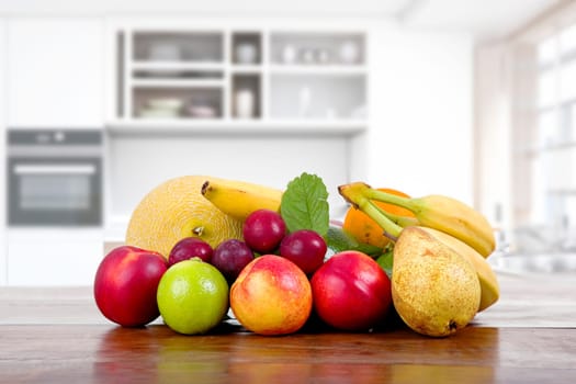 set of fruits at the kitchen table