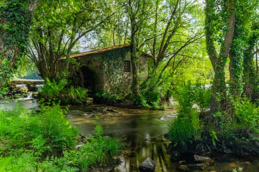 Long exposure near an ancient watermill in Cavado river, Braga, Portugal